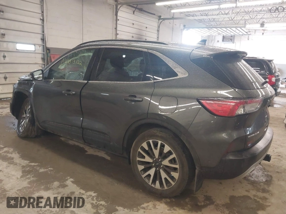 2020 Ford Escape Titanium with VIN 1FMCU9J95LUA39338, listed as a IAAI auction lot 42319122 with 34,631 mi miles and . Bid and sale history available at DreamBid. Image 3.