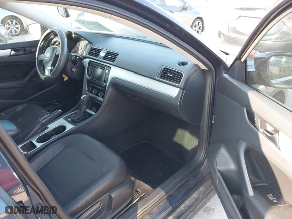 2013 Volkswagen Passat SE with VIN 1VWBP7A3XDC106575, listed as a IAAI auction lot 41856366 with 216,897 mi miles. Bid and sale history available at carsss.com. Image 5.