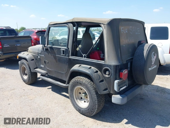 1998 Jeep Wrangler SE with VIN 1J4FY29P1WP806244, listed as a IAAI auction lot 41885627 with 131,486 mi miles. Bid and sale history available at carsss.com. Image 3.