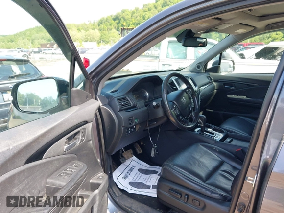 2018 Honda Ridgeline RTL-E with VIN 5FPYK3F74JB004162, listed as a IAAI auction lot 42180687 with 160,805 mi miles and . Bid and sale history available at DreamBid. Image 5.