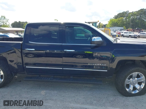 2015 Chevrolet Silverado 1500 LTZ with VIN 3GCUKSEC7FG145504, listed as a IAAI auction lot 41999825 with 206,560 mi miles and . Bid and sale history available at DreamBid. Image 13.