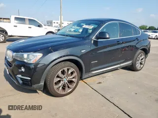 2015 BMW X4 xDrive28i with VIN 5UXXW3C52F0M87621, listed as a Copart auction lot 59176505 with 163,727 mi miles and Salvage title. Bid and sale history available at DreamBid. Image 1.