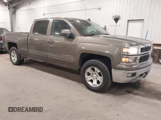 2015 Chevrolet Silverado 1500 LT with VIN 3GCUKREC5FG207488, listed as a IAAI auction lot 41472511 with 167,448 mi miles and . Bid and sale history available at DreamBid. Image 1.