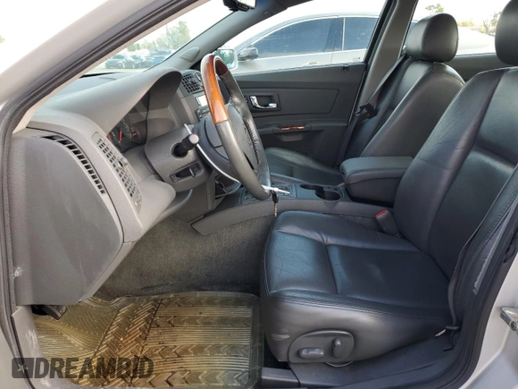 2003 Cadillac CTS with VIN 1G6DM57N430133534, listed as a Copart auction lot 72477954 with 131,181 mi miles and Salvage Title. Bid and sale history available at carsss.com. Image 7.