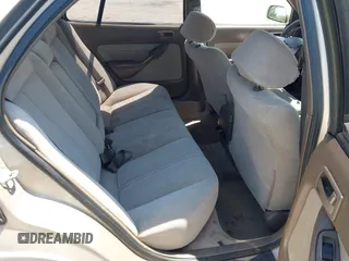 1995 Toyota Camry LE z VIN 4T1SK12E8SU872841, wystawiony jako IAAI lot #42025861 z przebiegiem 228 747 mil mil oraz . Historia ofert i sprzedaży dostępna na DreamBid. Obrazek 8.