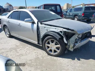 2005 Cadillac STS z VIN 1G6DC67A150120510, wystawiony jako IAAI lot #42304688 z przebiegiem 96 837 mil mil oraz . Historia ofert i sprzedaży dostępna na DreamBid. Obrazek 1.