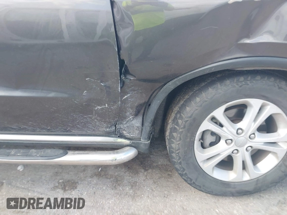 2013 Dodge Durango SXT with VIN 1C4RDHAG4DC686389, listed as a IAAI auction lot 42440260 with 166,952 mi miles and . Bid and sale history available at DreamBid. Image 6.