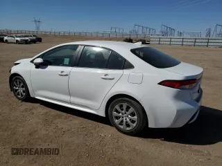 2021 Toyota Corolla LE with VIN 5YFEPMAE0MP211178, listed as a Copart auction lot 52559705 with 59,947 mi miles and Salvage Title. Bid and sale history available at DreamBid. Image 2.