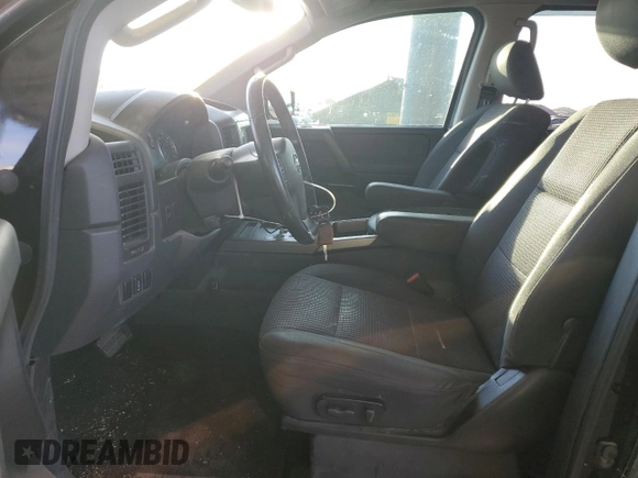 2012 Nissan Titan SV with VIN 1N6BA0ED5CN302776, listed as a Copart auction lot 55096625 with 128,484 mi miles and Salvage title. Bid and sale history available at DreamBid. Image 7.