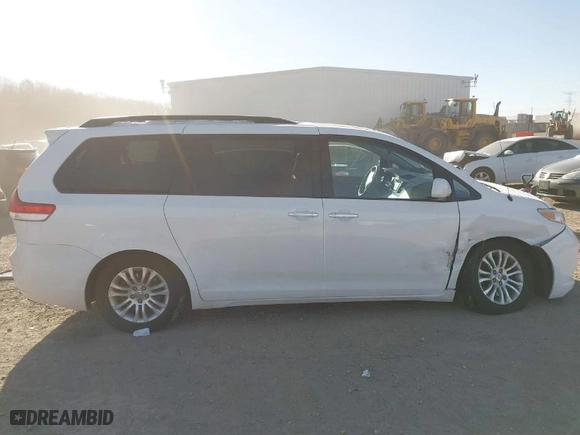 2013 Toyota Sienna XLE AAS with VIN 5TDYK3DC3DS308298, listed as a IAAI auction lot 41292280 with 165,638 mi miles. Bid and sale history available at carsss.com. Image 13.