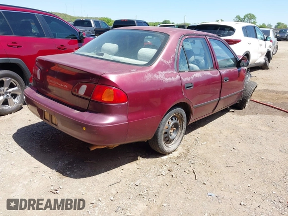 1998 Toyota Corolla VE with VIN 1NXBR12EXWZ011906, listed as a IAAI auction lot 42028529 with Not provided miles and . Bid and sale history available at DreamBid. Image 4.