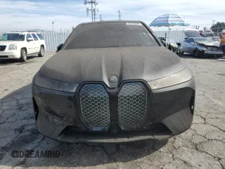 2023 BMW iX xDrive50 with VIN WB523CF0XPCL59062, listed as a Copart auction lot 43813935 with 7,788 mi miles and Salvage Title. Bid and sale history available at carsss.com. Image 5.
