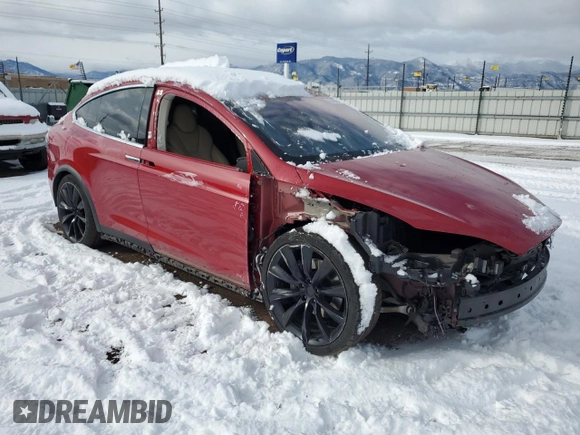 2016 Tesla Model X 70D with VIN 5YJXCAE23GF004772, listed as a Copart auction lot 45426655 with 77,453 mi miles and Salvage Title. Bid and sale history available at DreamBid. Image 4.