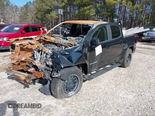 2022 Chevrolet Colorado 4WD Z71 with VIN 1GCGTDENXN1165279, listed as a IAAI auction lot 39042352 with Not provided miles and . Bid and sale history available at DreamBid. Image 2.