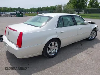 2011 Cadillac DTS Platinum Collection z VIN 1G6KP5ES8BU134913, wystawiony jako IAAI lot #42346157 z przebiegiem 60 608 mil mil oraz . Historia ofert i sprzedaży dostępna na DreamBid. Obrazek 4.