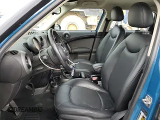 2012 MINI Countryman with VIN WMWZB3C51CWM02831, listed as a Copart auction lot 53821445 with 149,654 mi miles and Salvage Title. Bid and sale history available at DreamBid. Image 7.