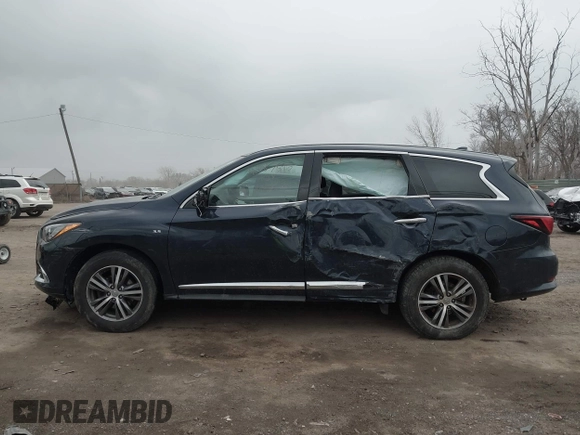 2019 Infiniti QX60 Luxe with VIN 5N1DL0MM1KC566946, listed as a IAAI auction lot 41887596 with 108,035 mi miles and . Bid and sale history available at DreamBid. Image 14.