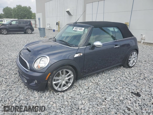 2012 MINI Convertible S with VIN WMWZP3C56CT250886, listed as a Copart auction lot 50027405 with 92,990 mi miles and Salvage title. Bid and sale history available at DreamBid. Image 1.