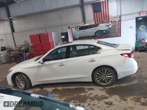 2021 Infiniti Q50 Luxe with VIN JN1EV7BR9MM752020, listed as a IAAI auction lot 41602470 with 61,392 mi miles and . Bid and sale history available at DreamBid. Image 14.