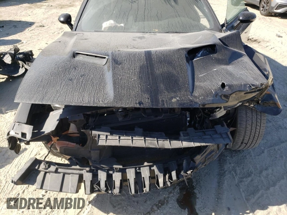 2015 Dodge Challenger R/T with VIN 2C3CDZAT1FH823432, listed as a Copart auction lot 77883964 with 126,929 mi miles and Salvage title. Bid and sale history available at DreamBid. Image 11.