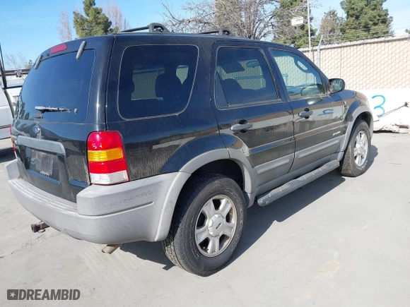 2001 Ford Escape XLT with VIN 1FMCU03181KA15501, listed as a IAAI auction lot 41857955 with 157,344 mi miles. Bid and sale history available at carsss.com. Image 4.