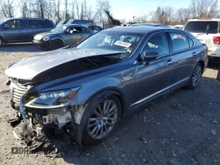 2015 Lexus LS 460 L with VIN JTHGL1EFXF5055493, listed as a Copart auction lot 86601044 with 130,849 mi miles and Salvage title. Bid and sale history available at DreamBid. Image 1.