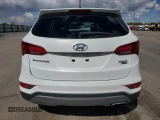 2018 Hyundai Santa Fe 2.4L z VIN 5NMZTDLB1JH076587, wystawiony jako Copart lot #51484585 z przebiegiem 106 026 mil mil oraz Szkoda całkowita • Salvage title. Historia ofert i sprzedaży dostępna na DreamBid. Obrazek 6.