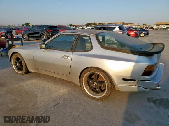 1986 Porsche 944 with VIN WP0AA0959GN151528, listed as a Copart auction lot 53332365 with 142,459 mi miles and Clean Title. Bid and sale history available at carsss.com. Image 2.