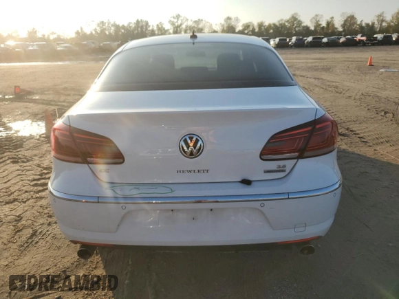 2014 Volkswagen CC VR6 Executive 4Motion with VIN WVWGU7AN3EE529054, listed as a Copart auction lot 84469334 with 163,433 mi miles and Clean Title. Bid and sale history available at carsss.com. Image 6.