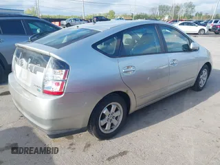 2004 Toyota Prius with VIN JTDKB20U940020058, listed as a IAAI auction lot 42142257 with 141,705 mi miles. Bid and sale history available at carsss.com. Image 4.