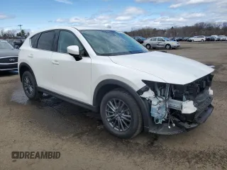 2020 Mazda CX-5 Touring with VIN JM3KFBCM8L0868020, listed as a Copart auction lot 53257795 with 74,189 mi miles and Salvage Title. Bid and sale history available at carsss.com. Image 4.