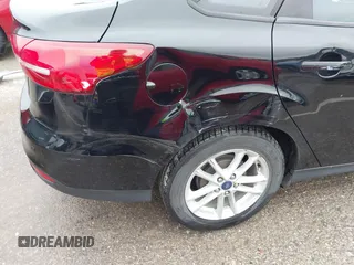 2016 Ford Focus SE with VIN 1FADP3F29GL356629, listed as a IAAI auction lot 41946558 with 86,430 mi miles and . Bid and sale history available at DreamBid. Image 6.