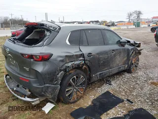2024 Mazda CX-50 Premium Plus with VIN 7MMVABEY2RN234511, listed as a IAAI auction lot 41639766 with 8,705 mi miles and . Bid and sale history available at DreamBid. Image 4.