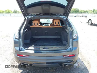 2021 Cadillac XT4 FWD Sport with VIN 1GYFZER41MF079193, listed as a IAAI auction lot 42331594 with 72,287 mi miles and . Bid and sale history available at DreamBid. Image 18.
