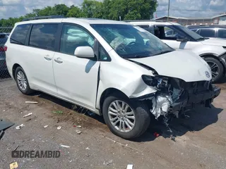 2015 Toyota Sienna XLE with VIN 5TDYK3DC5FS623932, listed as a IAAI auction lot 42716247 with 93,291 mi miles and . Bid and sale history available at DreamBid. Image 1.