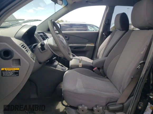 2006 Hyundai Tucson GL with VIN KM8JM12B66U342188, listed as a Copart auction lot 63140444 with 168,587 mi miles and Salvage Title. Bid and sale history available at carsss.com. Image 7.