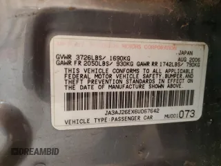 2006 Mitsubishi Lancer ES z VIN JA3AJ26EX6U067642, wystawiony jako Copart lot #51628485 z przebiegiem 163 060 mil mil oraz Szkoda całkowita • Salvage title. Historia ofert i sprzedaży dostępna na DreamBid. Obrazek 14.