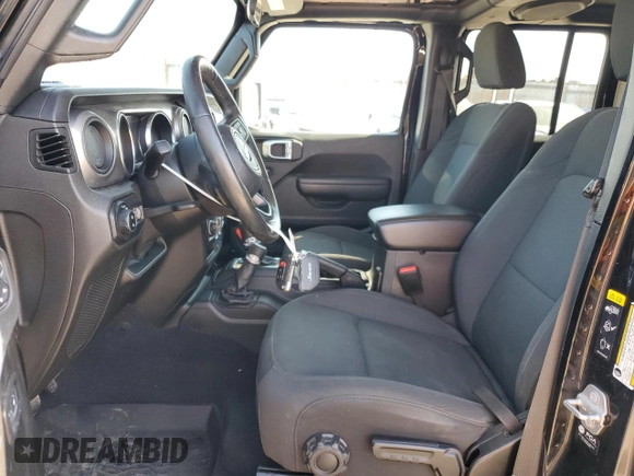 2021 Jeep Gladiator Willys with VIN 1C6HJTAG8ML563161, listed as a Copart auction lot 52734195 with 48,521 mi miles and Salvage title. Bid and sale history available at DreamBid. Image 7.