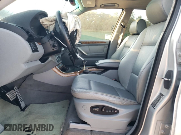 2000 BMW X5 4.4i with VIN WBAFB3355YLH05755, listed as a Copart auction lot 77136744 with 0 mi miles and Salvage Title. Bid and sale history available at carsss.com. Image 7.