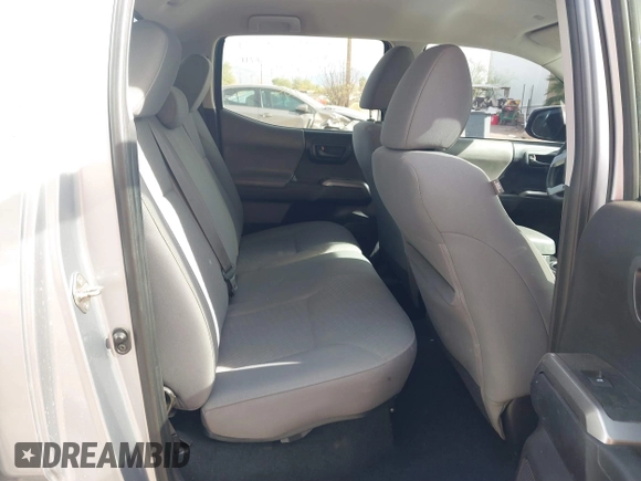 2020 Toyota Tacoma SR5 with VIN 3TMCZ5AN1LM324828, listed as a IAAI auction lot 40977362 with 33,906 mi miles and . Bid and sale history available at DreamBid. Image 8.