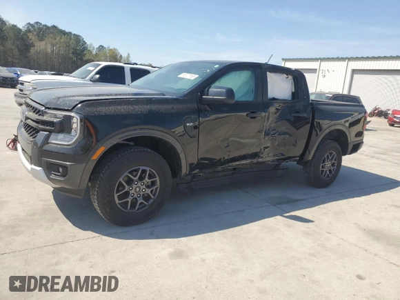 2024 Ford Ranger XLT with VIN 1FTER4HH7RLE02106, listed as a Copart auction lot 50977165 with 3,555 mi miles and Salvage title. Bid and sale history available at DreamBid. Image 1.