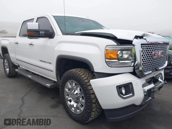 2015 GMC Sierra 2500HD Denali with VIN 1GT120E85FF681680, listed as a IAAI auction lot 42081711 with 67,676 mi miles and . Bid and sale history available at DreamBid. Image 1.