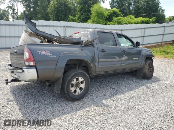 2010 Toyota Tacoma PreRunner with VIN 5TEJU4GN7AZ711911, listed as a Copart auction lot 60200385 with 209,579 mi miles and Salvage title. Bid and sale history available at DreamBid. Image 3.