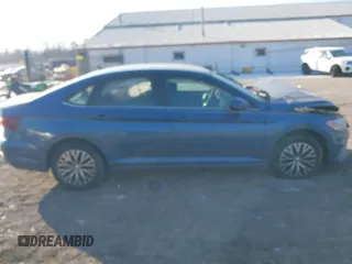 2021 Volkswagen Jetta S z VIN 3VWC57BU0MM054745, wystawiony jako IAAI lot #39772920 z przebiegiem 31 453 mil mil oraz . Historia ofert i sprzedaży dostępna na DreamBid. Obrazek 13.