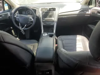 2017 Ford Fusion Hybrid SE with VIN 3FA6P0LU1HR266939, listed as a Copart auction lot 61018305 with 121,293 mi miles and Salvage title. Bid and sale history available at DreamBid. Image 8.
