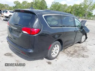2021 Chrysler Voyager LXi z VIN 2C4RC1DG1MR515709, wystawiony jako IAAI lot #41866568 z przebiegiem 93 883 mil mil oraz . Historia ofert i sprzedaży dostępna na DreamBid. Obrazek 4.