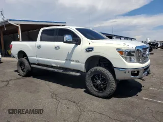 2016 Nissan Titan Platinum Reserve z VIN 1N6BA1F41GN504539, wystawiony jako Copart lot #64812975 z przebiegiem 143 144 mil mil oraz Szkoda całkowita • Salvage title. Historia ofert i sprzedaży dostępna na DreamBid. Obrazek 4.