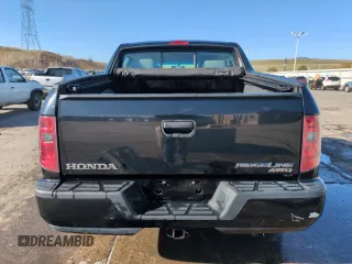2011 Honda Ridgeline RT z VIN 5FPYK1F24BB009159, wystawiony jako Copart lot #51923715 z przebiegiem 121 639 mil mil oraz Szkoda całkowita • Salvage title. Historia ofert i sprzedaży dostępna na DreamBid. Obrazek 6.