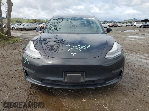 2019 Tesla Model 3 Long Range with VIN 5YJ3E1EB8KF384533, listed as a Copart auction lot 48557255 with 73,768 mi miles and Salvage Title. Bid and sale history available at carsss.com. Image 5.
