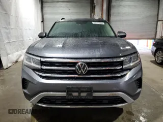 2021 Volkswagen Atlas SE z VIN 1V2LP2CAXMC610564, wystawiony jako Copart lot #56072395 z przebiegiem 64 140 mil mil oraz Tytuł czysty. Historia ofert i sprzedaży dostępna na DreamBid. Obrazek 5.